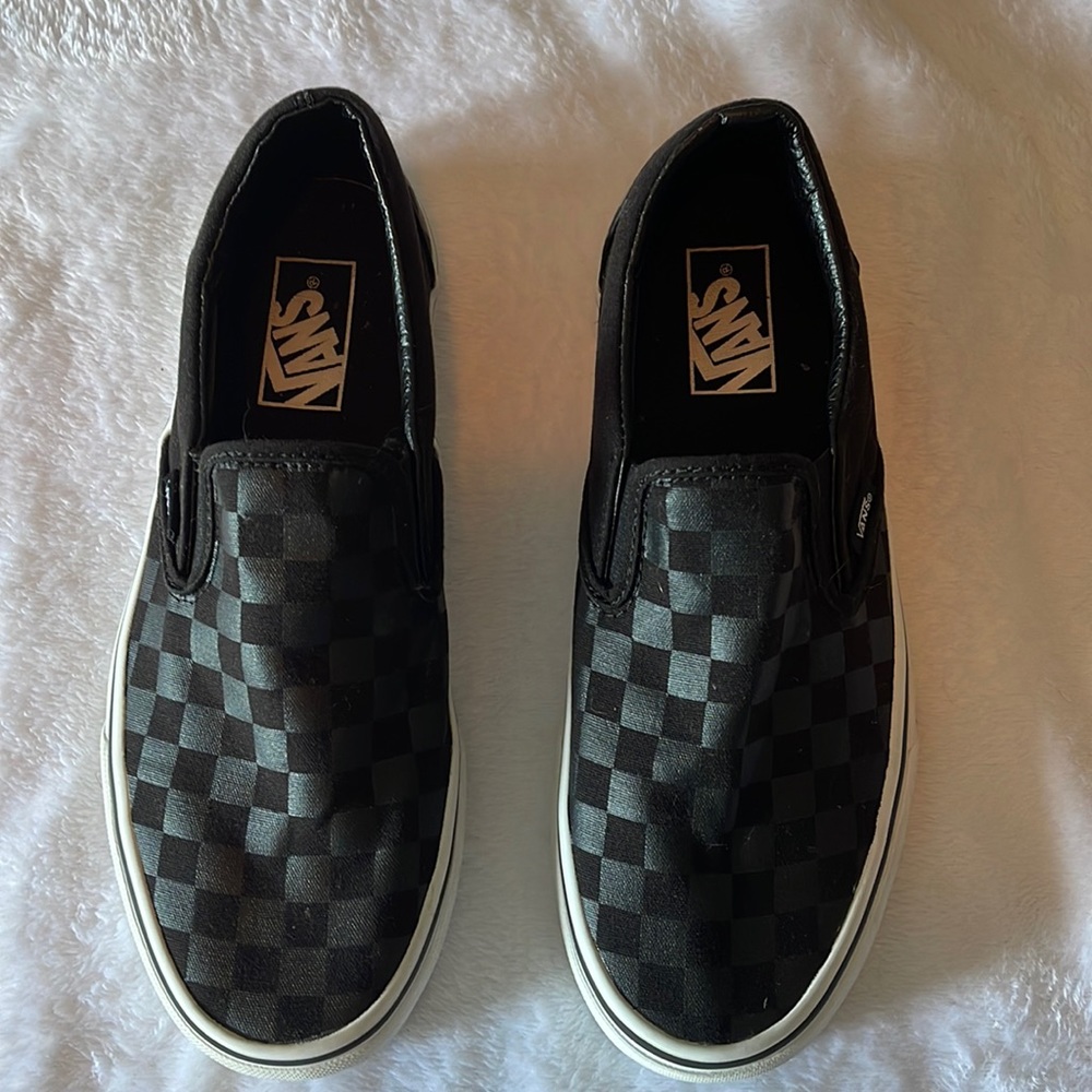 Vans black/gray checkered loafers.